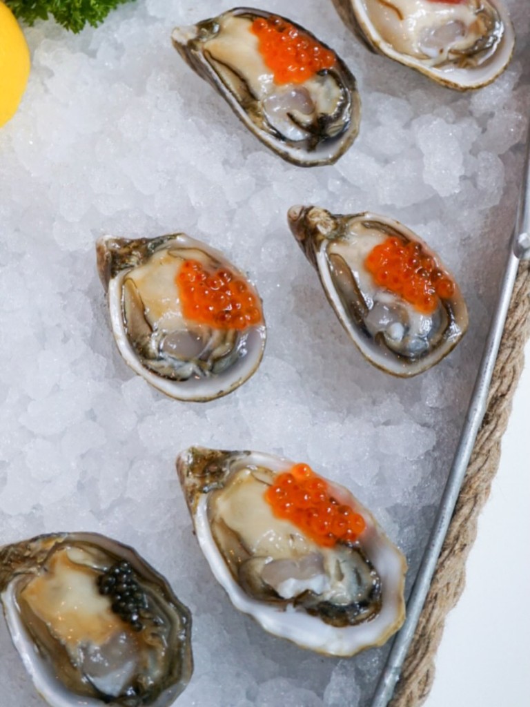 Oysters with salmon roe