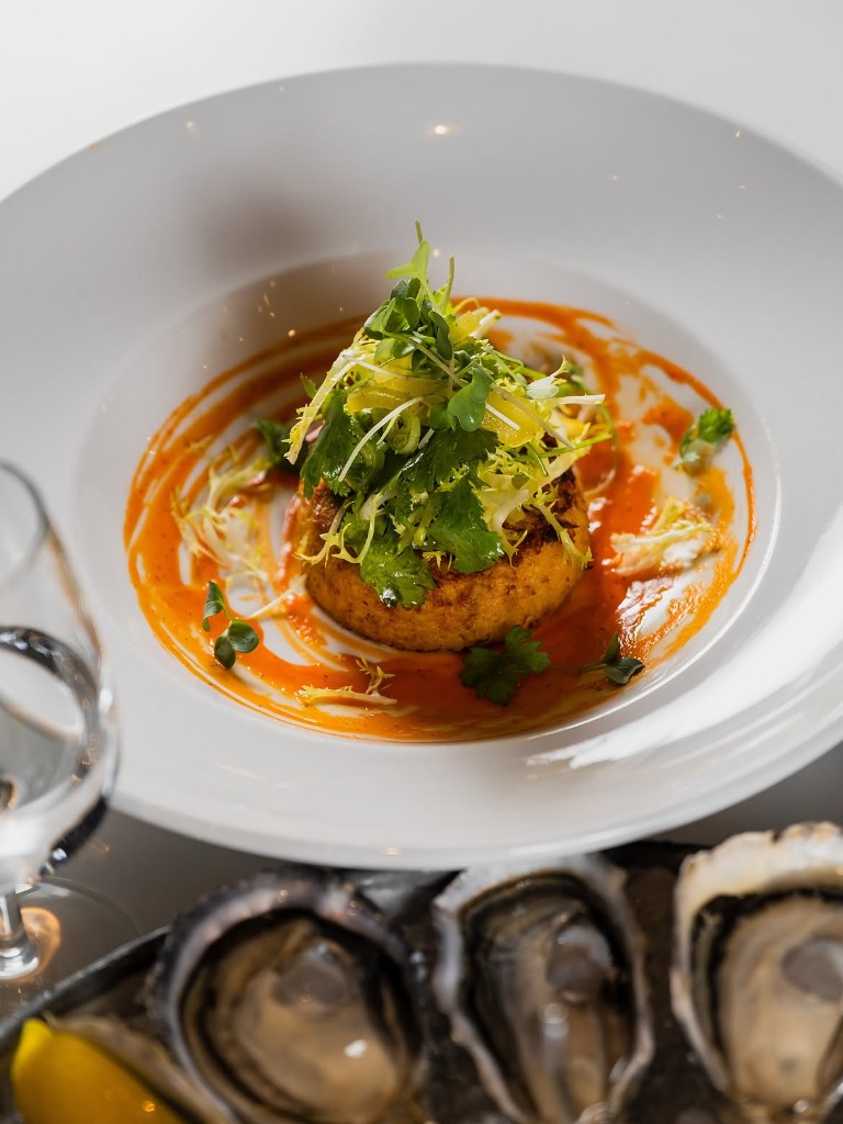 Herb-topped cake with oysters
