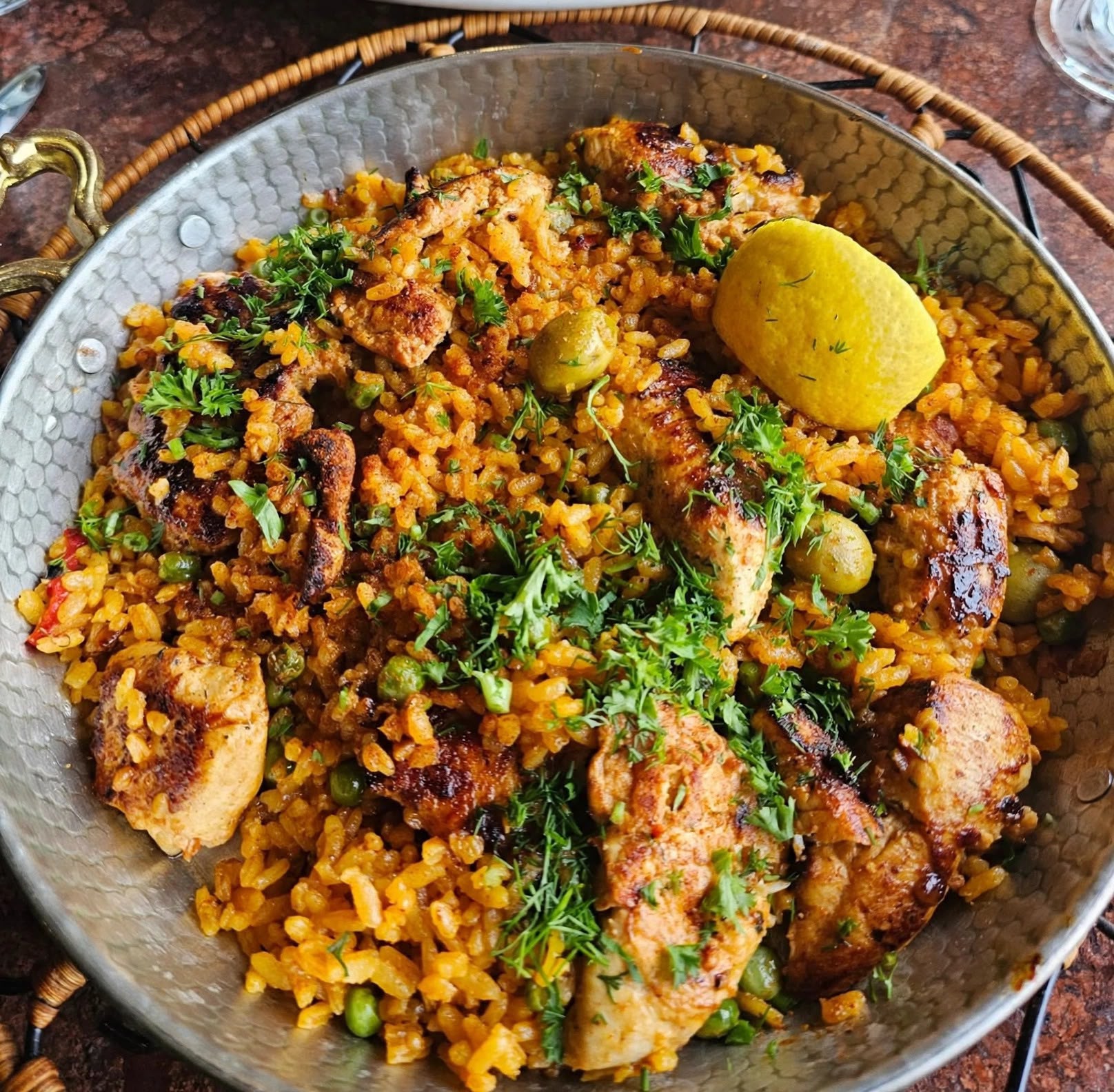 Chicken paella with olives and lemon