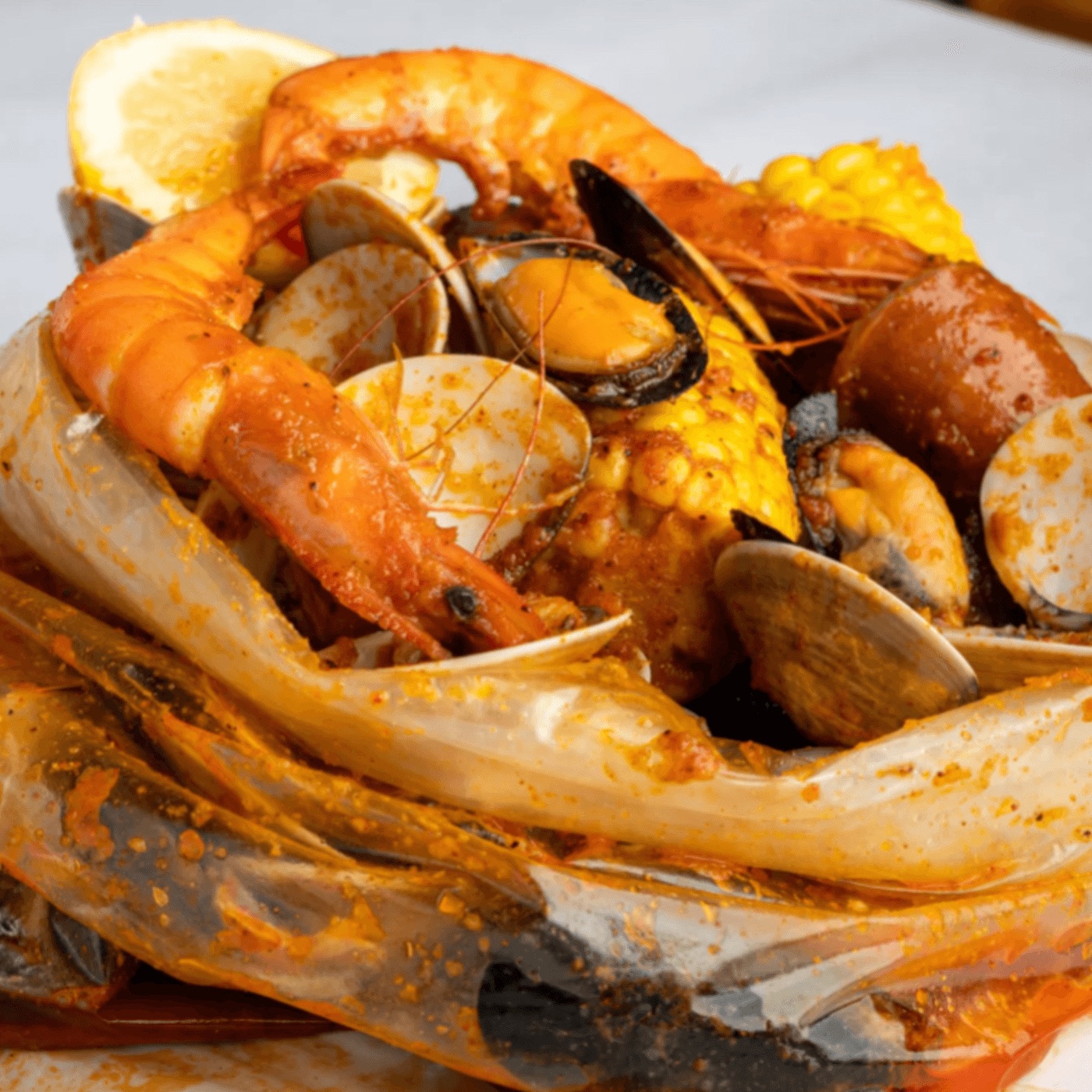 Shrimp, clams and mussels in the bag · photo: Crab N' Spice
