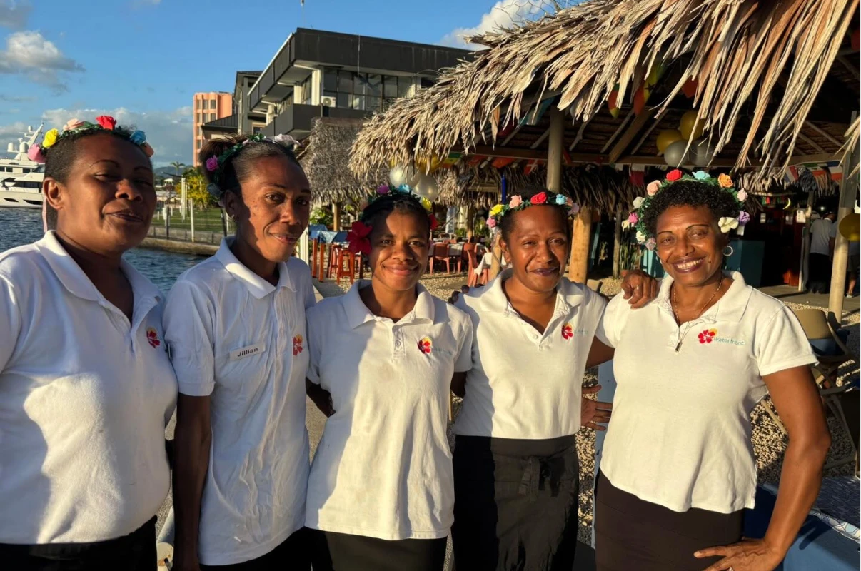 The Waterfront team under the thatch · photo: Waterfront Bar & Grill