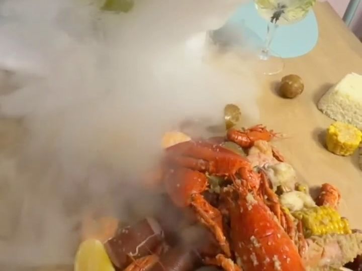 Lobster boil with a dry-ice drink
