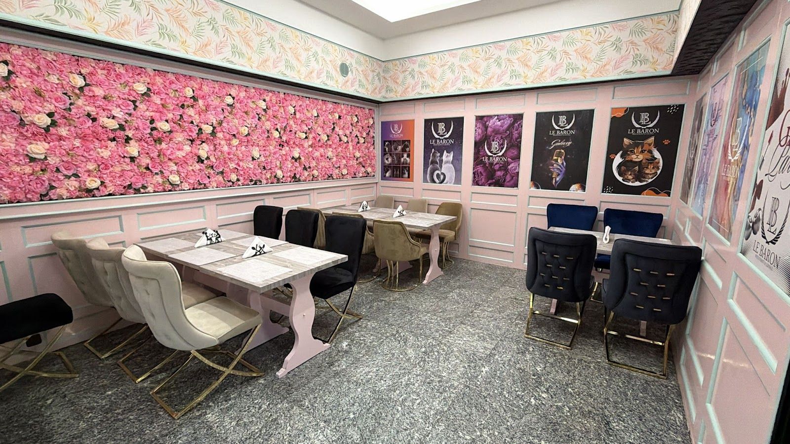 Dining room with the rose wall and Le Baron posters