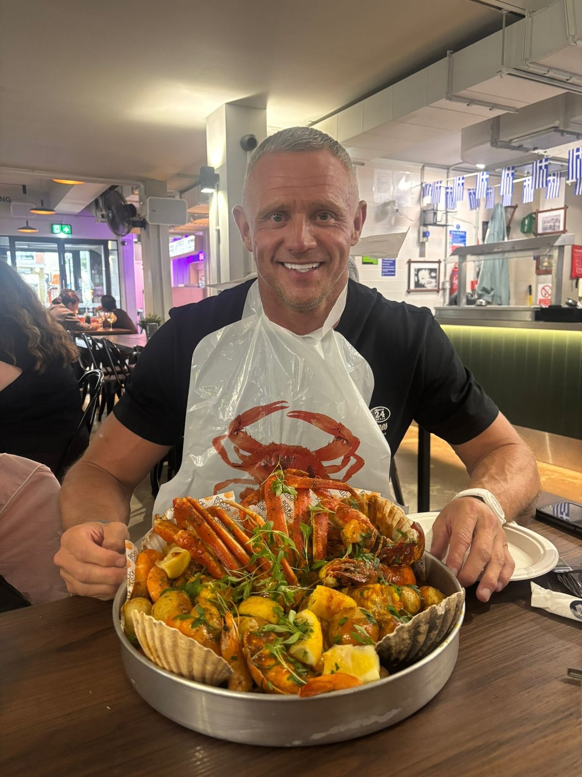 Diner with seafood boil (firecracker sauce) at Albert Hall Swansea